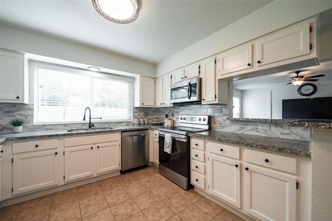 kitchen oversee main living area | Image 14