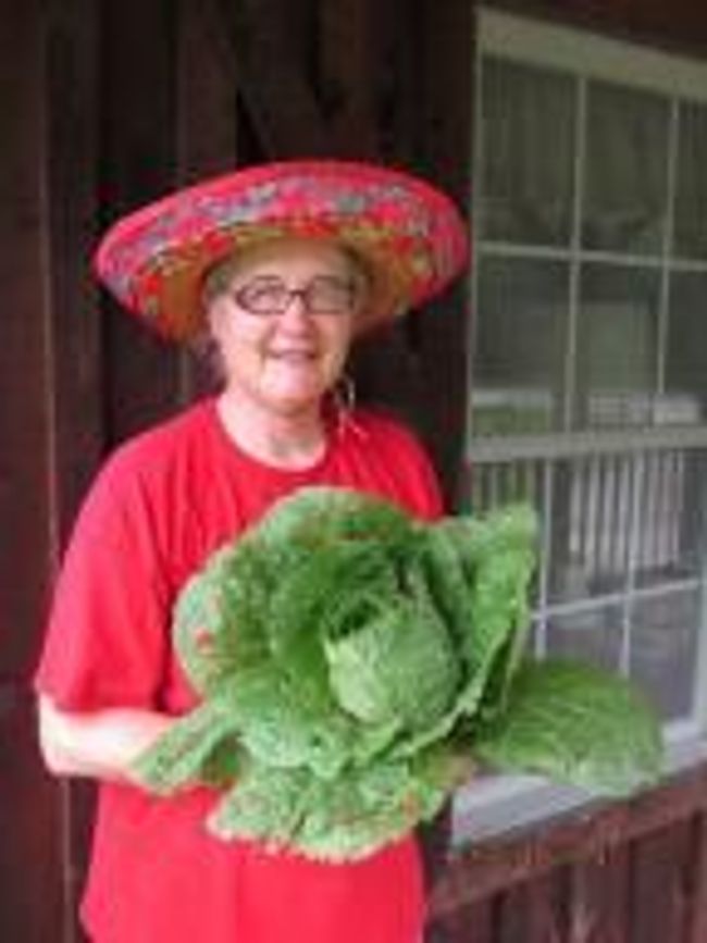 Seller furnished pic showing her with produce she grew here! | Image 56