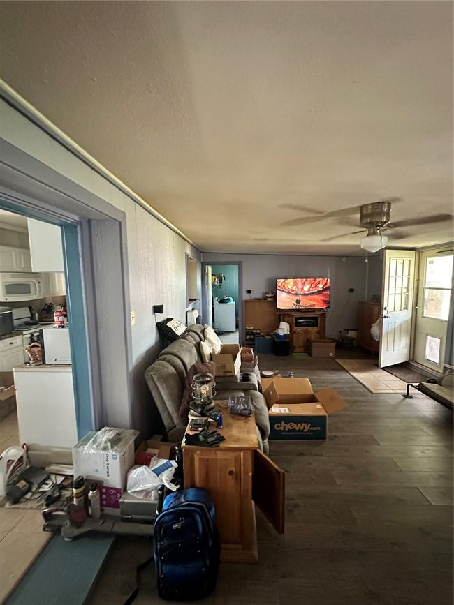 Back living room area to utility room and back porch | Image 16