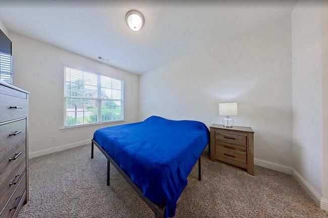 2nd bedroom downstairs with en suite bath | Image 24