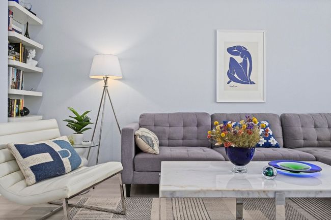 Living room with wood finished floors | Image 14