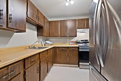 328 - 10120 Brookpark Blvd Sw, Condo with 3 bedrooms, 1 bathrooms and 2 parking in Calgary AB | Image 2