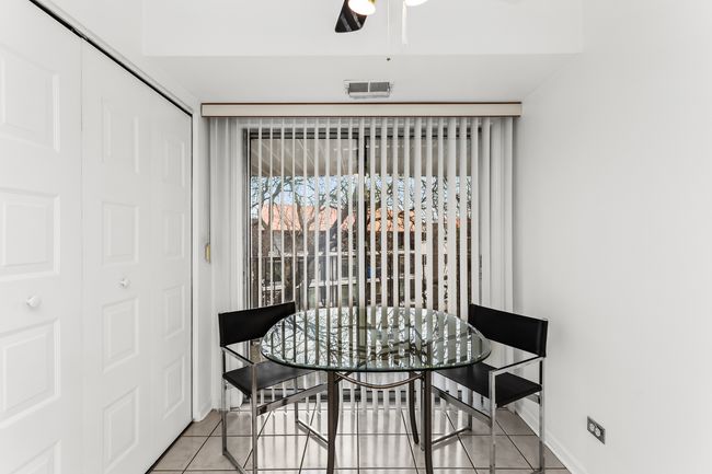 table space with large pantry closet and patio doo | Image 8