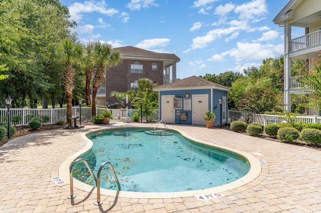 View of swimming pool featuring a patio | Image 21