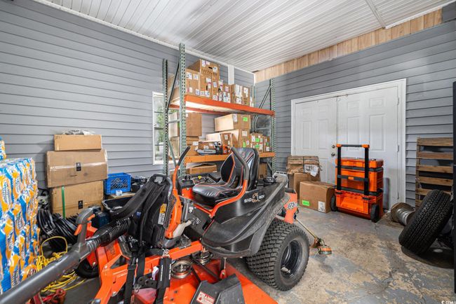 Garage with wooden walls | Image 23