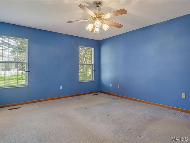 Primary Bedroom featuring carpet flooring and ceiling fan | Image 21