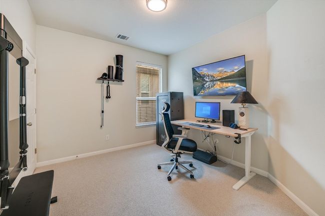 Carpeted home office with baseboards | Image 23