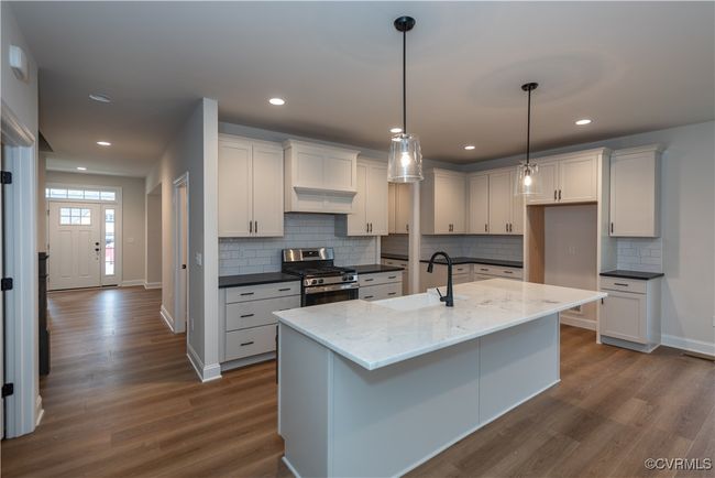 Home is under construction now. Photos are of similar home in the community and may demonstrate optional finishes. Actual photos to come as home nears completion. | Image 7