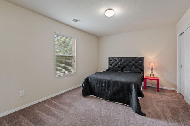 Secondary bedroom number 2 overlooks the front porch. | Image 33