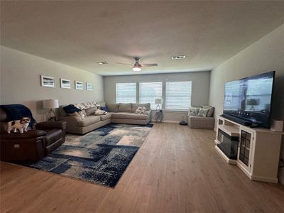 Living room with lots of natural light and vinyl plank flooring | Image 3