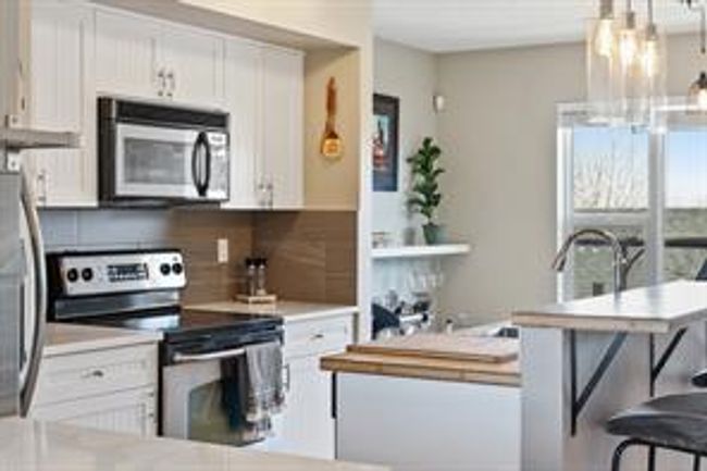 10 Panatella Hill Nw, Home with 2 bedrooms, 2 bathrooms and 2 parking in Calgary AB | Image 12