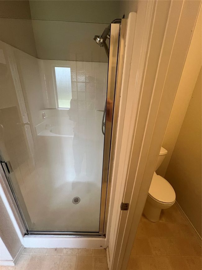 Bathroom featuring a stall shower | Image 36