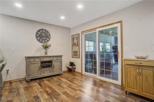 Entryway featuring baseboards, visible vents, dark wood-style flooring, and recessed lighting | Image 9
