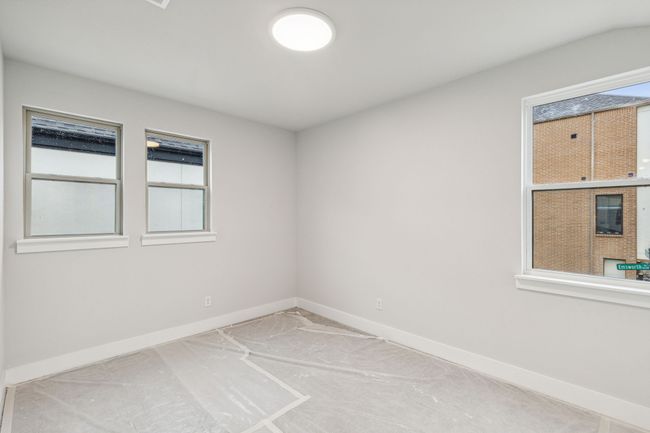 Secondary bedroom with baseboards | Image 19