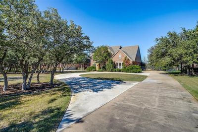 Circular driveway and 3-car garage allows for plenty of parking. | Image 2