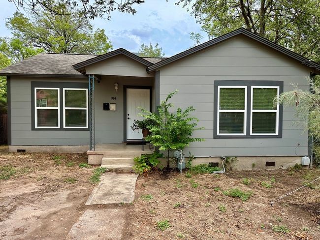 View of front facade featuring crawl space and a shingled roof | Image 25
