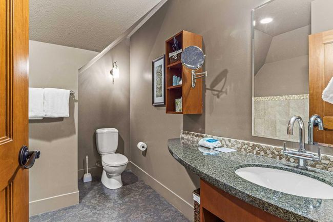 402 - 191 Kananaskis Way, Condo with 3 bedrooms, 3 bathrooms and 1 parking in Canmore AB | Image 22