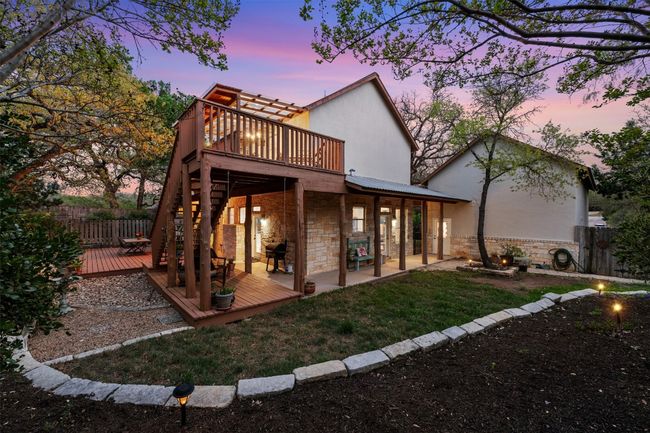 The yard wraps around the entire home providing more space for outdoor activities. | Image 34