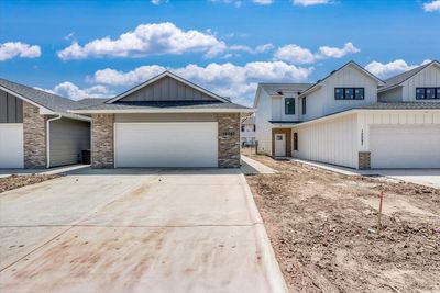 View of front of house featuring a garage | Image 1