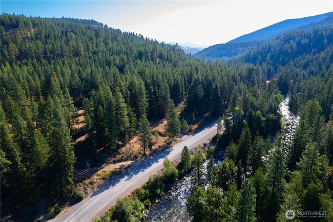 The property is bordered to the north and south by the National Forest. | Image 12