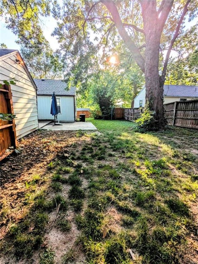 Fenced backyard featuring a patio area | Image 18