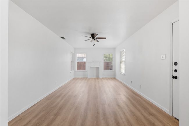 Living room looking toward faux fireplace | Image 4