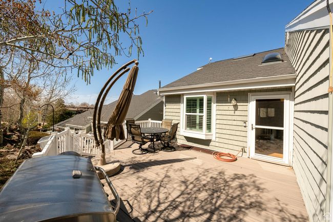 View of patio / terrace with outdoor dining area and a wooden deck | Image 6