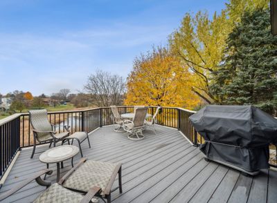 Deck (with Trex decking) overlooks fenced yard and pond | Image 2