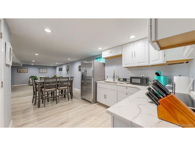 8438 Ames St, House other with 5 bedrooms, 3 bathrooms and null parking in Arvada CO | Image 39