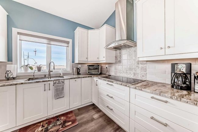 26 Mackenzie Ave, House other with 5 bedrooms, 3 bathrooms and 2 parking in Lacombe AB | Image 4