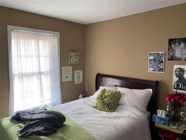 Bedroom featuring multiple windows | Image 14