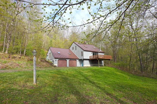 Three bedrooms, lots of family space. Huge garage, large walkout basement. | Image 1