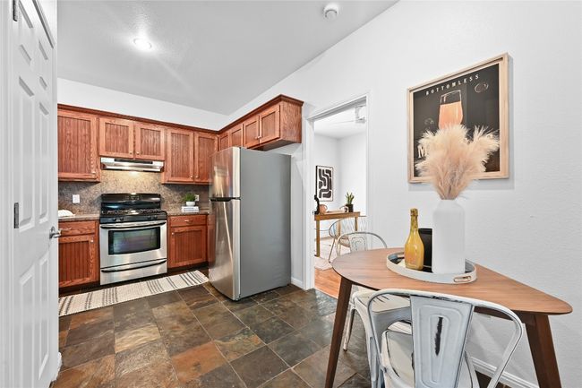 A small but ample breakfast area within the kitchen. | Image 9