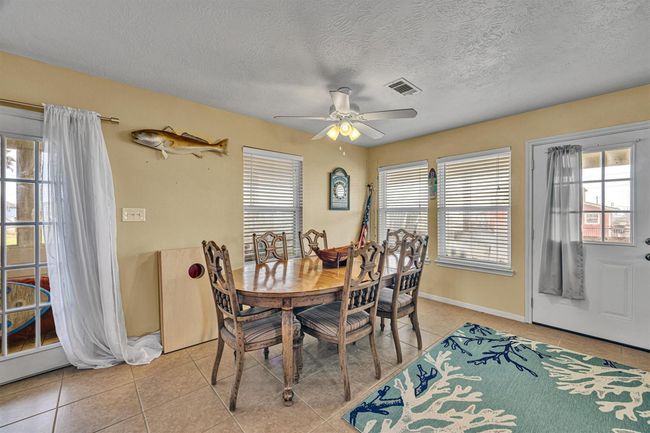 Another view of the dining area. | Image 7