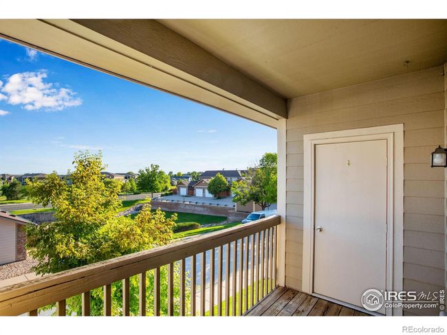 Private, covered balcony w/ Storage area | Image 18