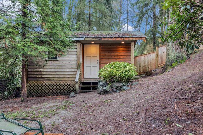 View of outdoor structure featuring entry steps | Image 29