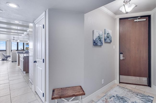 Front door entry with extra closet. | Image 23