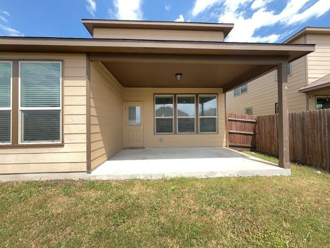Rear view of house featuring a patio area | Image 21