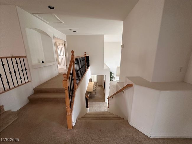 Stairway with carpet flooring and attic access | Image 10
