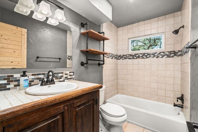 Full bathroom with industrial accents | Image 19