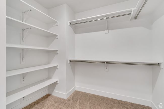 Spacious closet with carpet flooring | Image 18