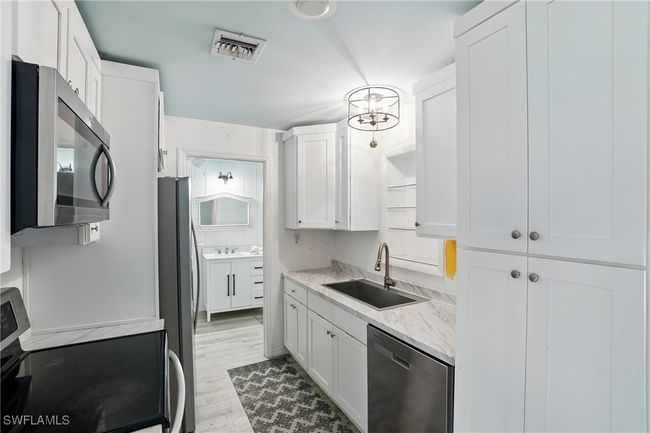 4011 Coconut Cir S, House other with 2 bedrooms, 2 bathrooms and null parking in NAPLES FL | Image 7
