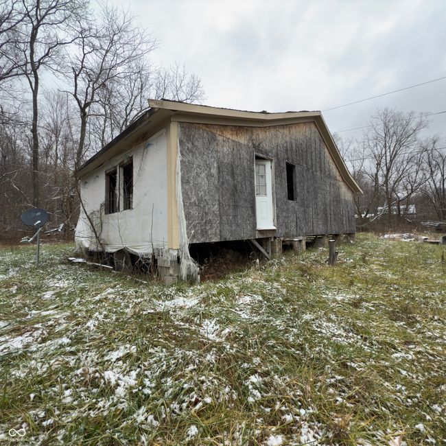 Smaller home down the hill. | Image 14