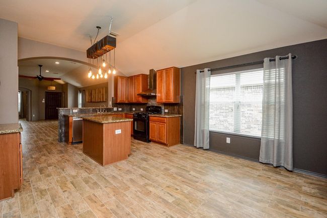 The breakfast nook overlooks the kitchen area. | Image 15