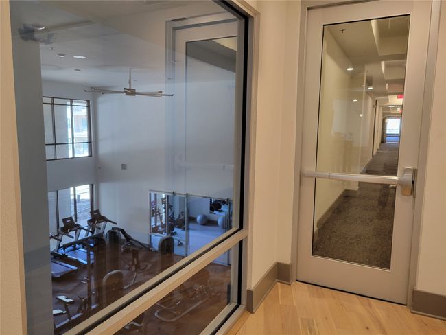 Hall with recessed lighting, light wood-type flooring, and a healthy amount of sunlight | Image 20