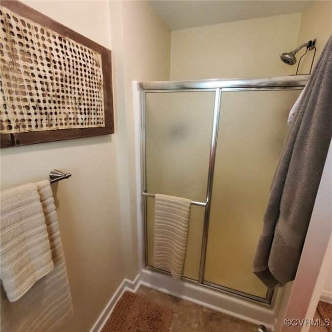 Full bathroom with an enclosed shower and baseboards | Image 37