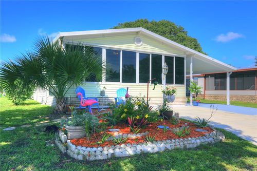 711 Amaryllis Dr, Barefoot Bay, FL, 32976-7181 | Card Image