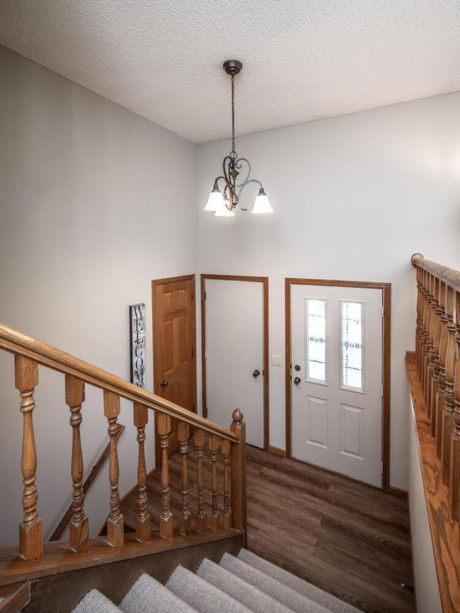 Nice sized foyer with chandelier & closet. | Image 24