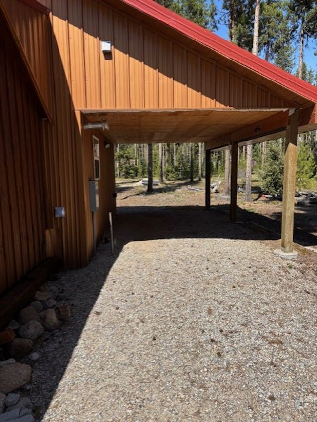 View of car parking with a carport | Image 22