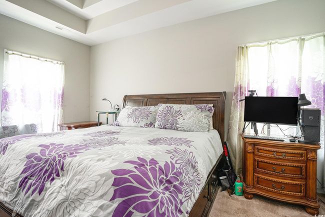 View of carpeted bedroom | Image 12